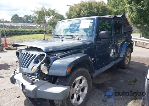 2007 Jeep Wrangler Unlimited Sahara z USA, uszkodzony, nr VIN 1J4GB59117L111449